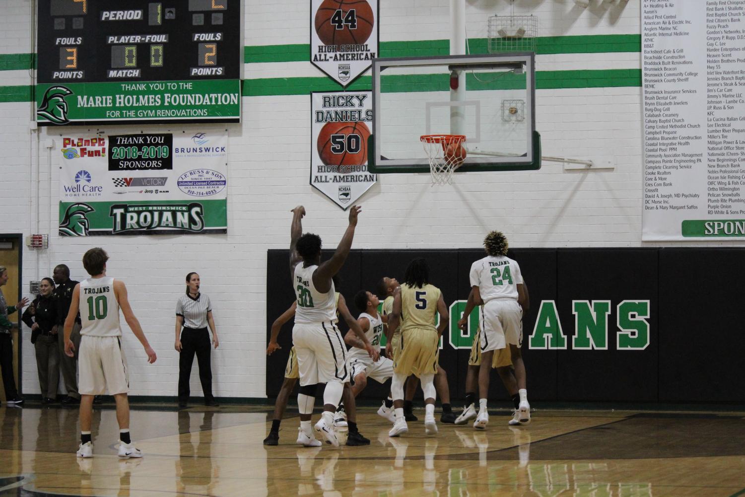 Varsity Men's Basketball: Trojans vs. Scorpions