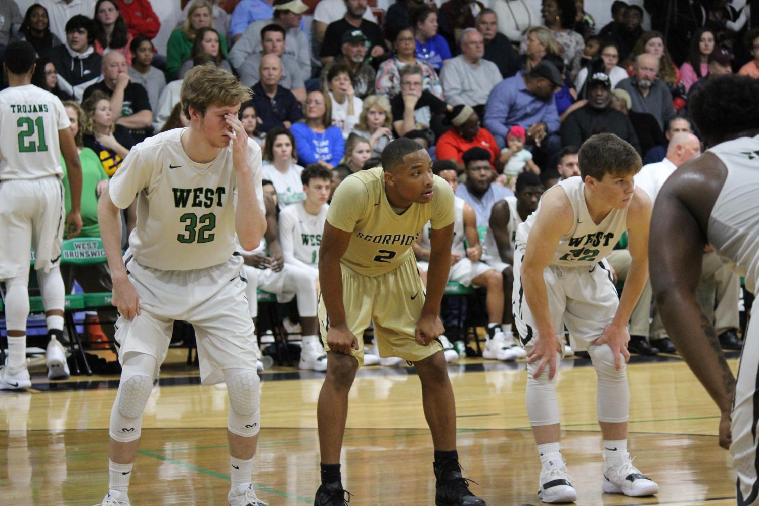 Varsity Men's Basketball: Trojans vs. Scorpions