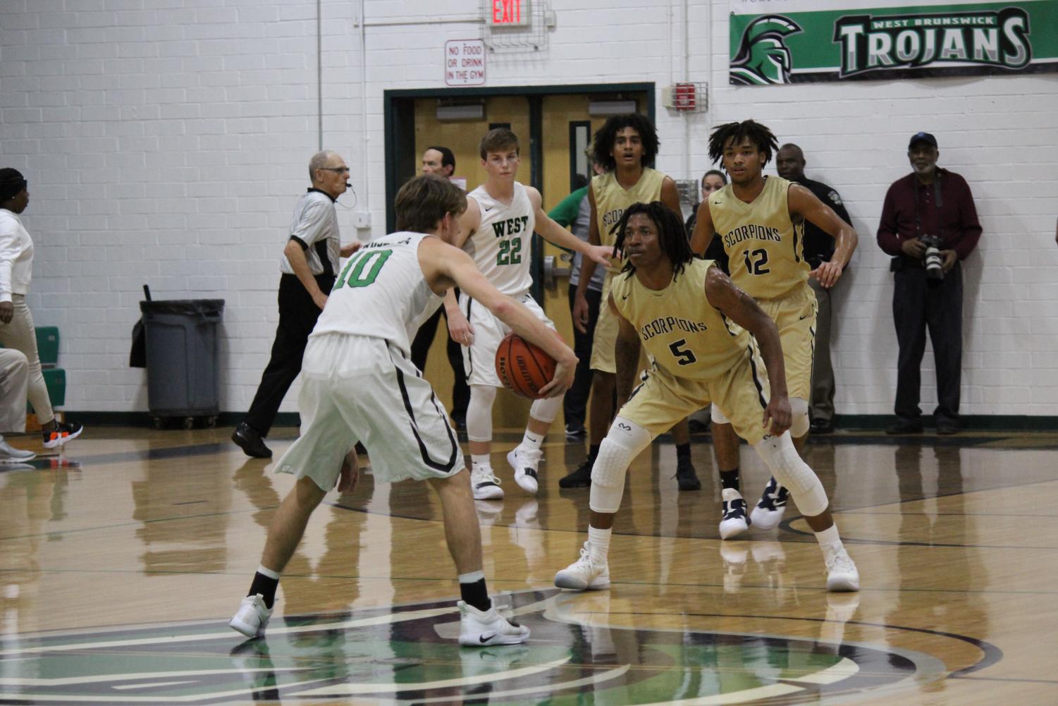 Varsity Men's Basketball: Trojans vs. Scorpions