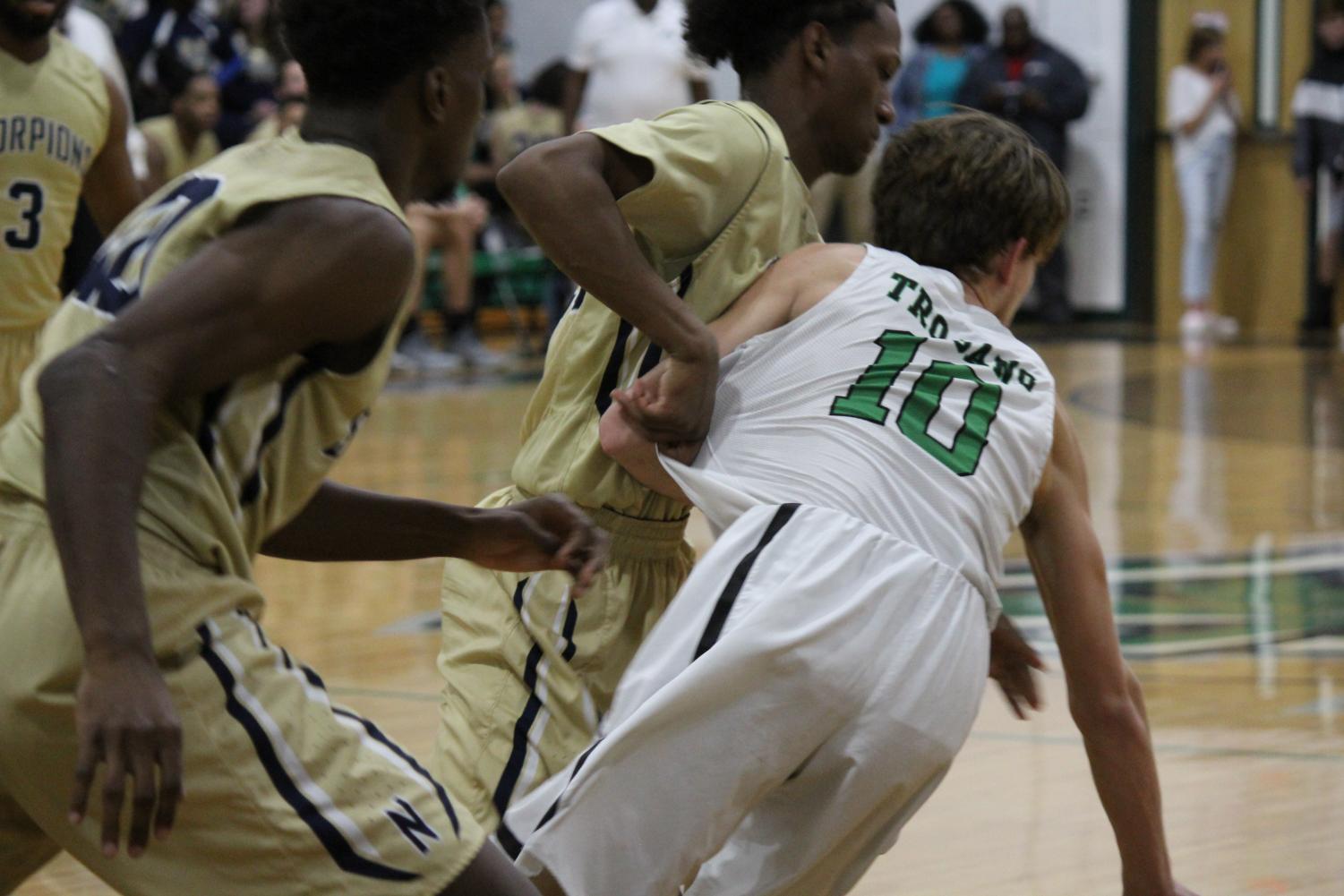 Varsity Men's Basketball: Trojans vs. Scorpions