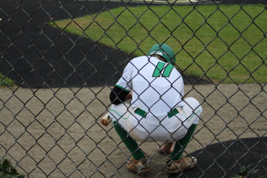 Senior Ethan Reed prepares to step up to home plate