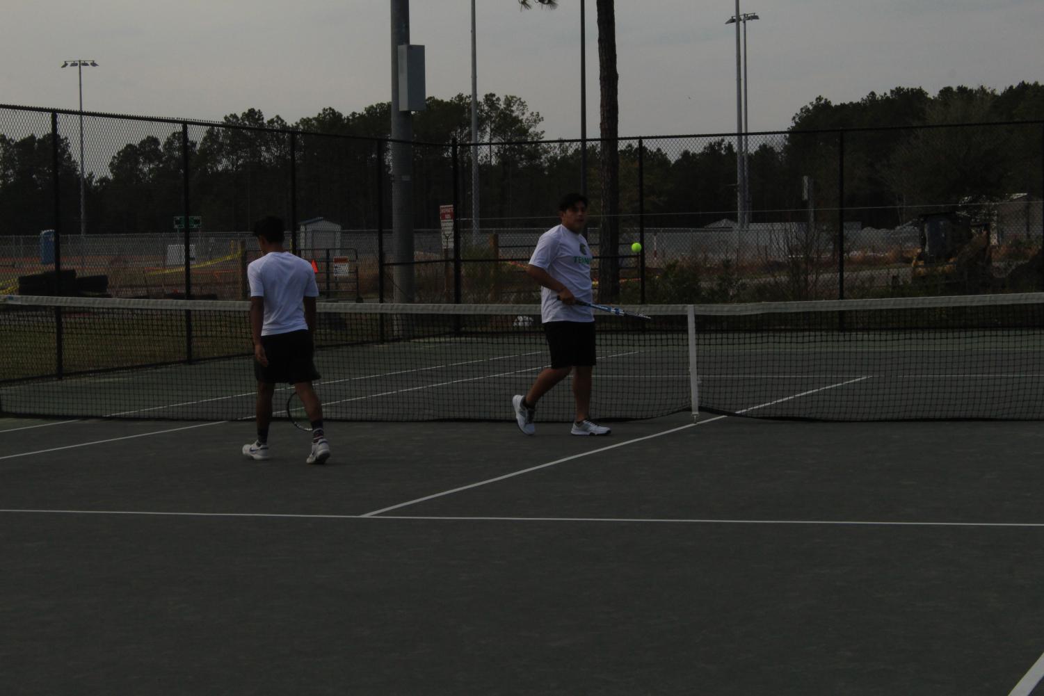 Men's Tennis: Wildcats defeat Trojans