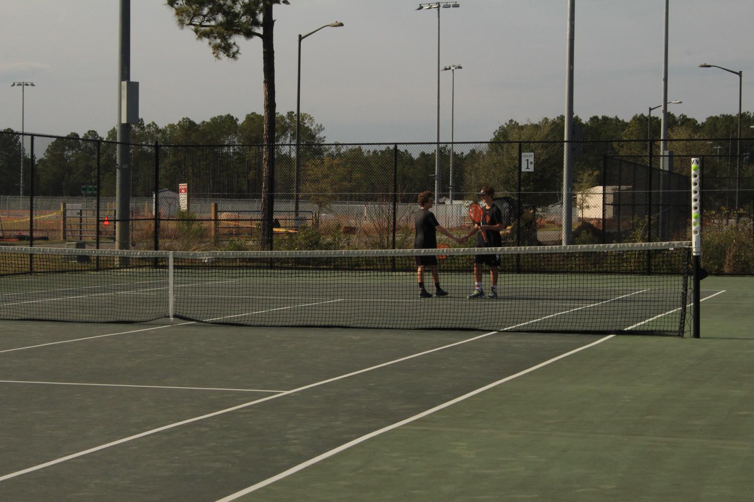Men's Tennis: Wildcats defeat Trojans