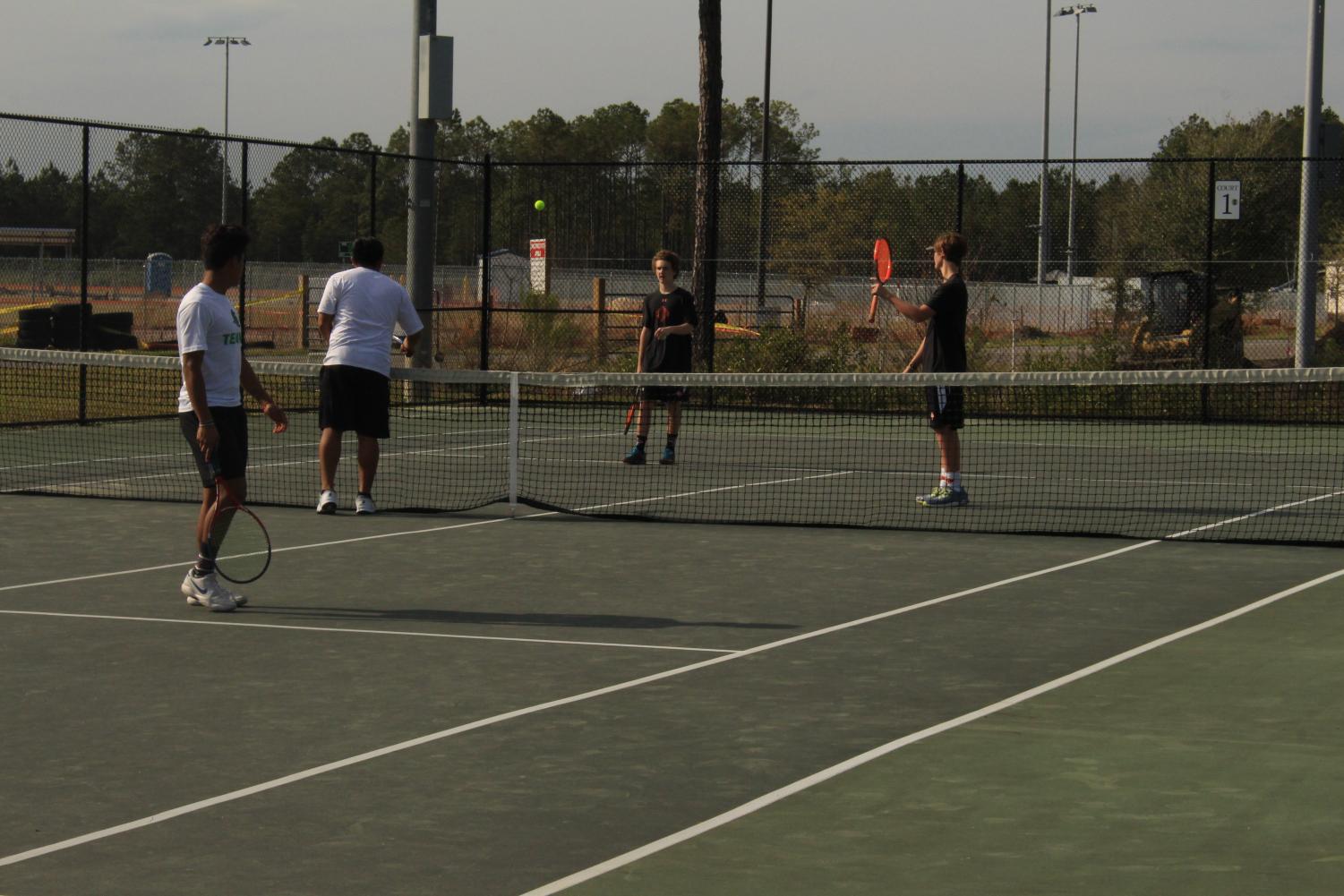 Men's Tennis: Wildcats defeat Trojans