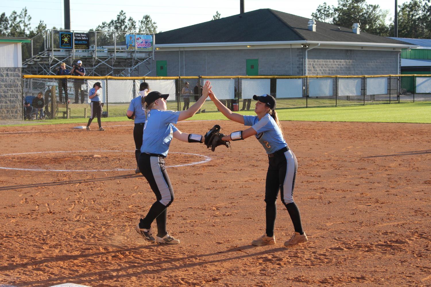 Lady Trojans Defeat the Sharks
