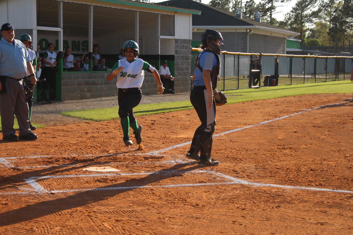 Lady Trojans Defeat the Sharks