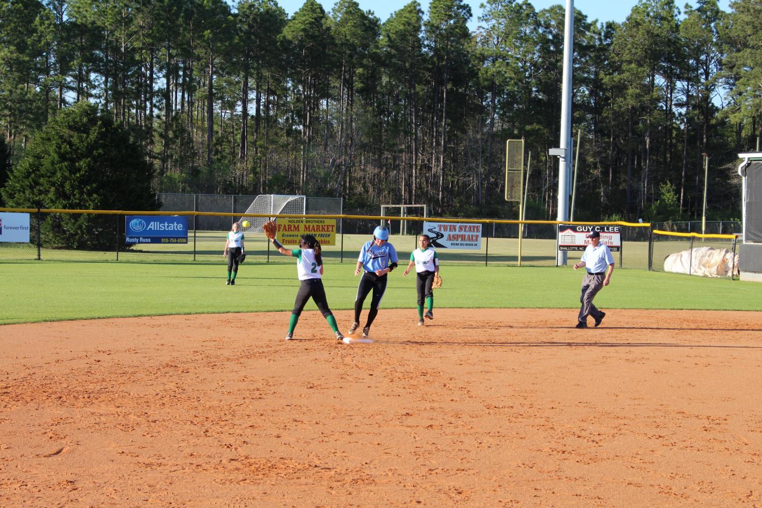 Lady Trojans Defeat the Sharks