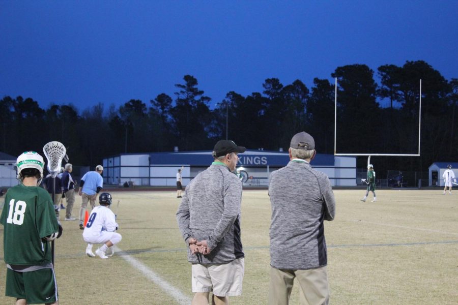 WBHS Coaches discuss strategy on the sideline.