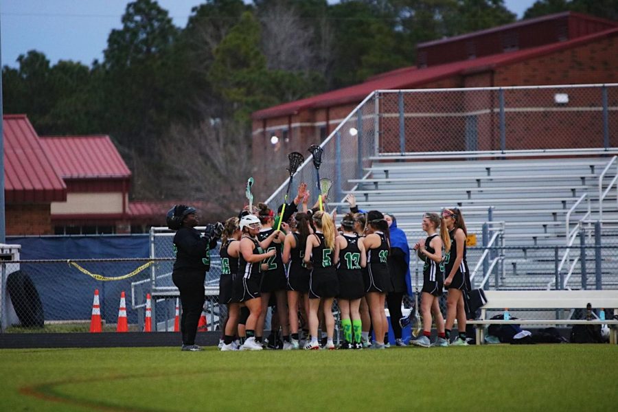 West Brunswick Womens Lacrosse Team has a meeting before playing the South Brunswick Cougars.