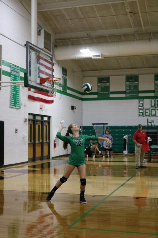 Sophomore, Brianna Leonard, prepares to serve the ball.