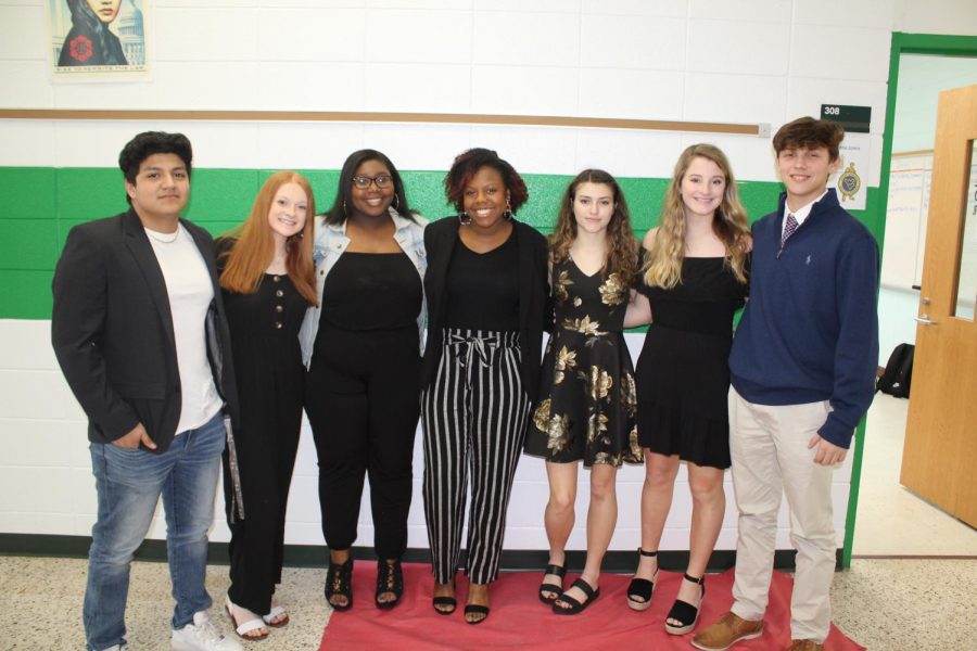 Juniors William Lopez, Jackie Hubbard, Tajah McCray, Aniah Metts, Alexis Dombroski, Casey Pardue, and Cole Hamilton dress up for a presentation in their American History class.