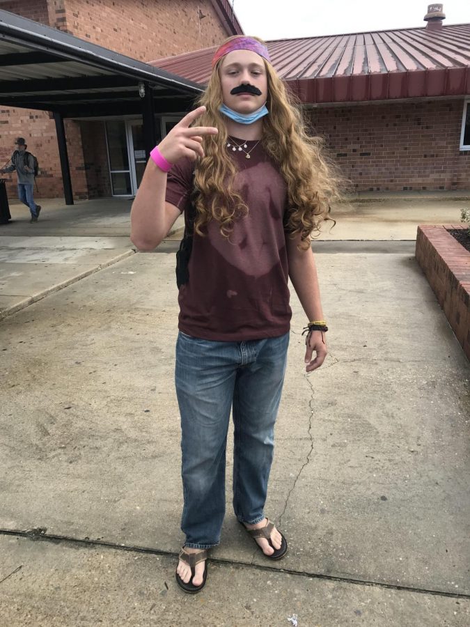 Corbin Skipper dresses up as a hippie. 