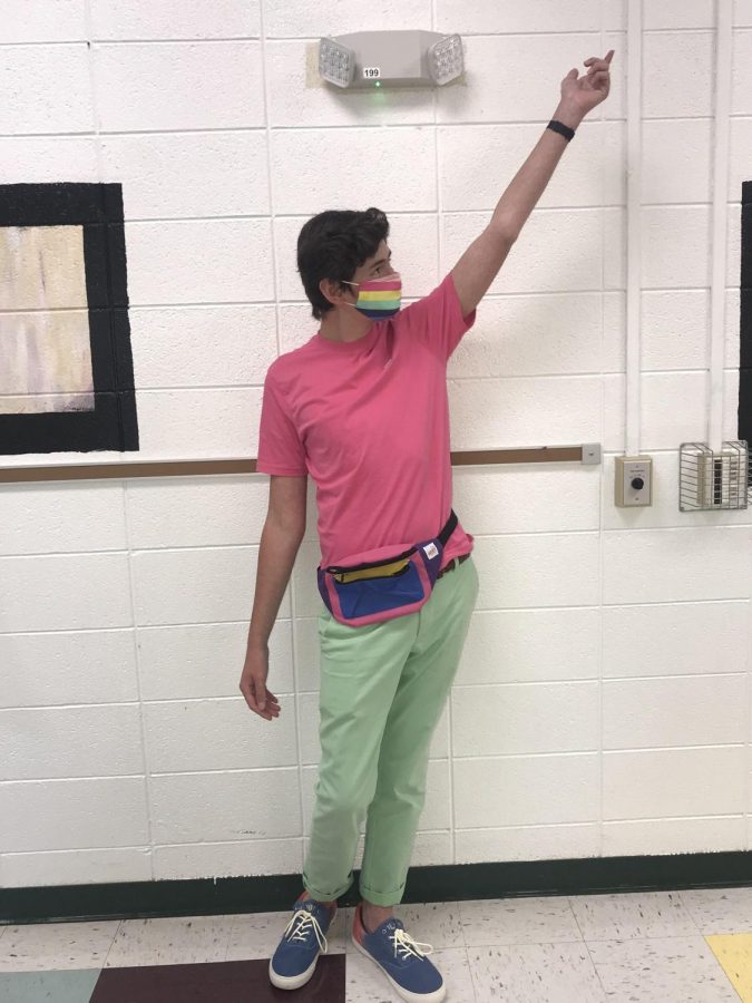 Aiden McKinney poses for decade day dressed up for the 80s 