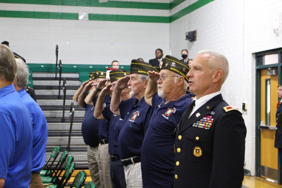 Retired+Colonel+Joe+Calisto+and+other+retired+Veterans+saluting+the+flag+during+the+pledge.+