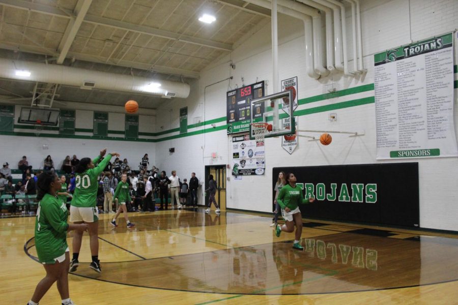 Aaliyah Ward shoots a 2 pointer during warm-ups to get herself ready for victory