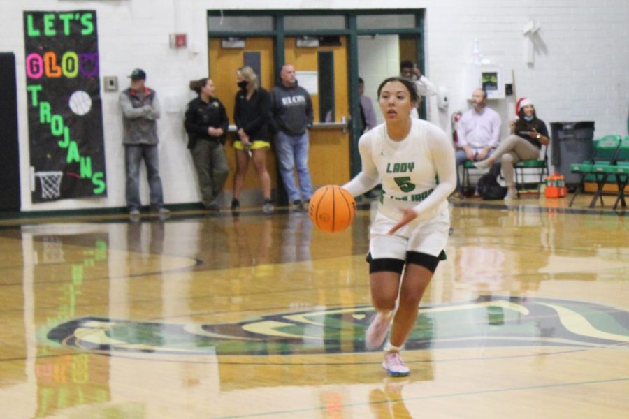 Hailey Woodard bringing the ball down the court.