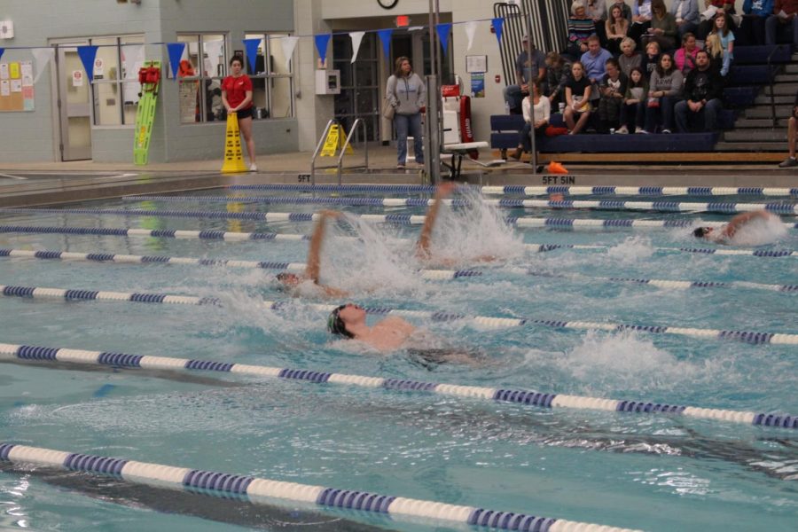 Jakob Mahon competing in the backstroke event.