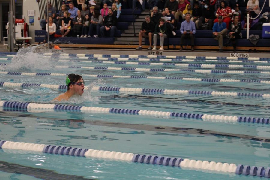 Sophomore, Seth Williams, performing a breaststroke. 