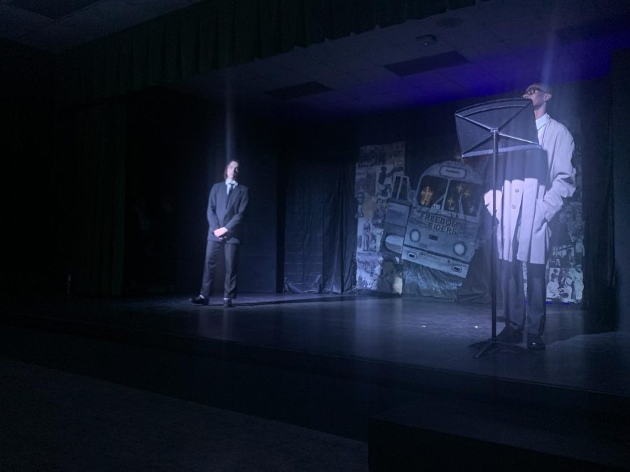 Jaden Marlowe playing Malcom X and James Chaney giving a speech. 