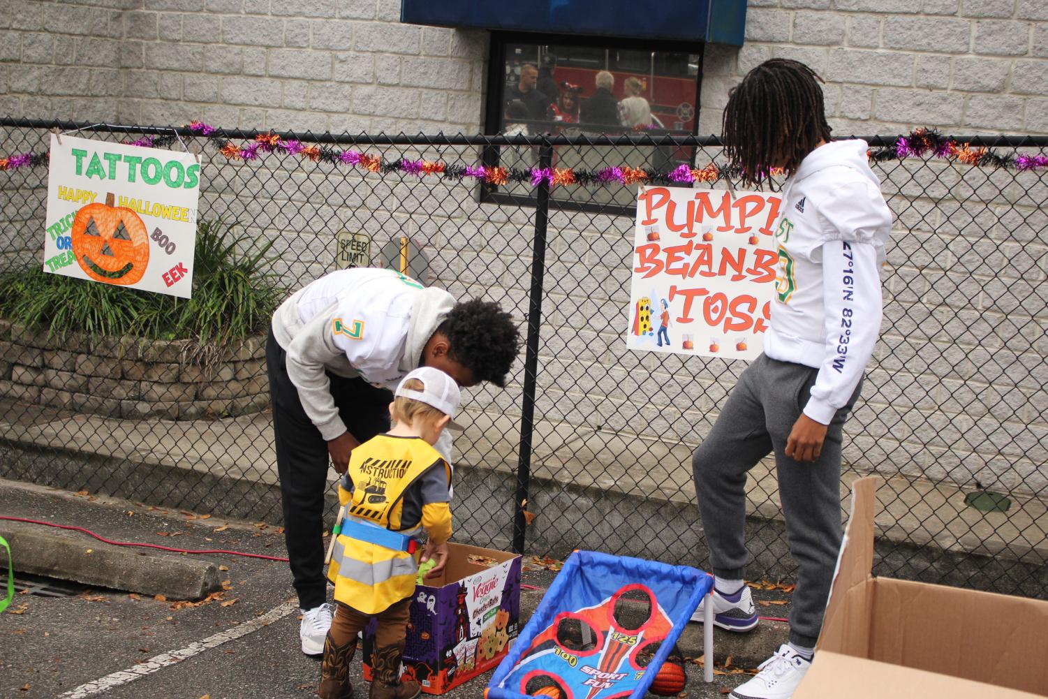 Trojan Athletes Volunteer at the For Kids Only Fall Festival