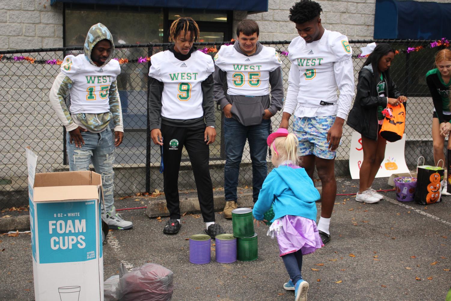 Trojan Athletes Volunteer at the For Kids Only Fall Festival