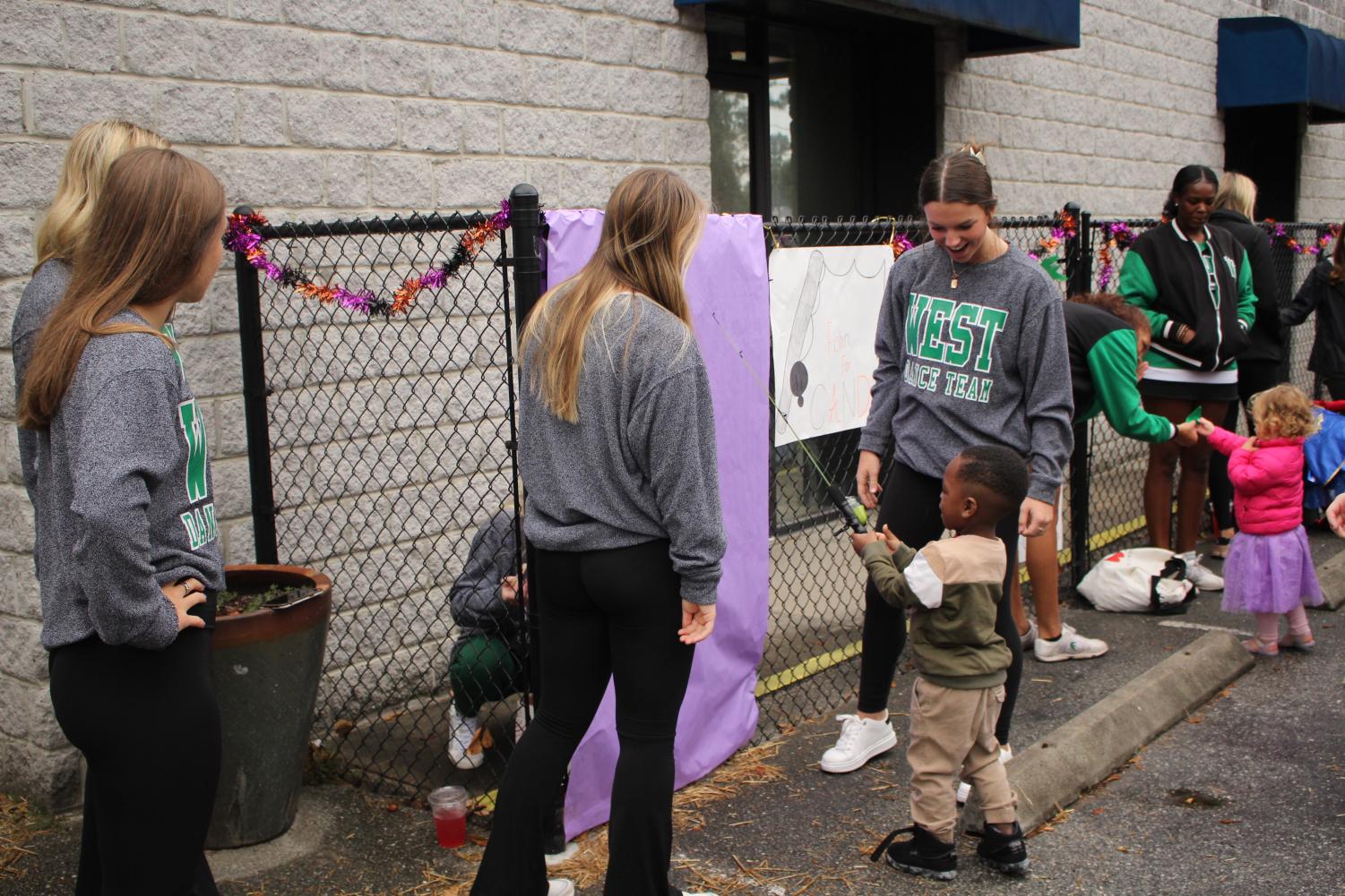 Trojan Athletes Volunteer at the For Kids Only Fall Festival