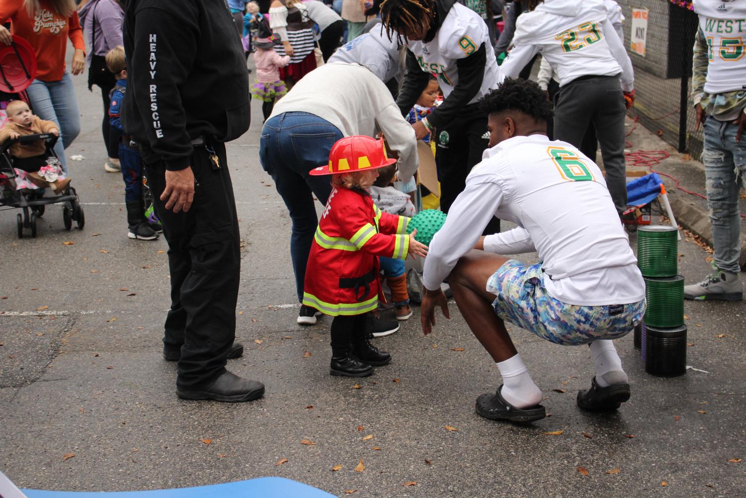 Trojan Athletes Volunteer at the For Kids Only Fall Festival