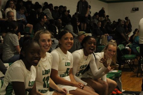 ... Brooklyn Coble, Hailey Woodard, Morgan Bellamy, and ... getting ready to rock the court. 