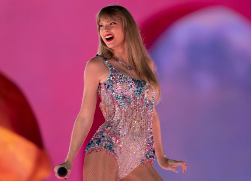 Taylor Swift Smiling Onstage During One Of Her Eras Tour Shows.