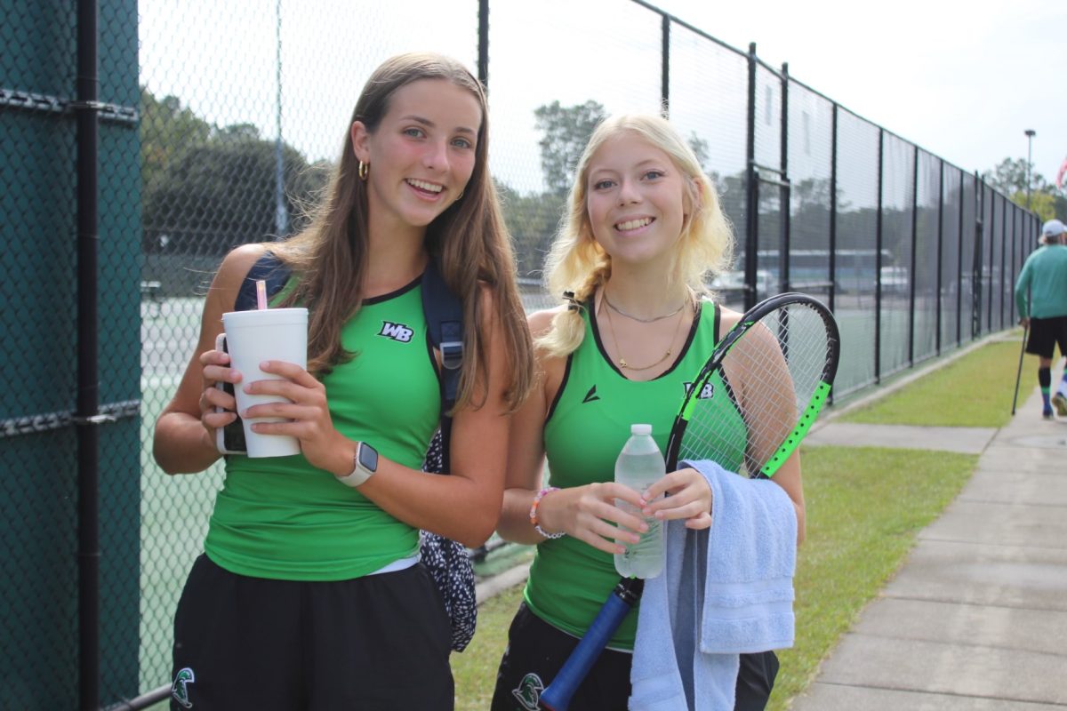 West Brunswick High School Tennis Players Hanging Out After Brief Practice