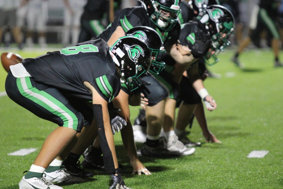 West Brunswick offensive line ready to block against South Brunswicks defensive line.