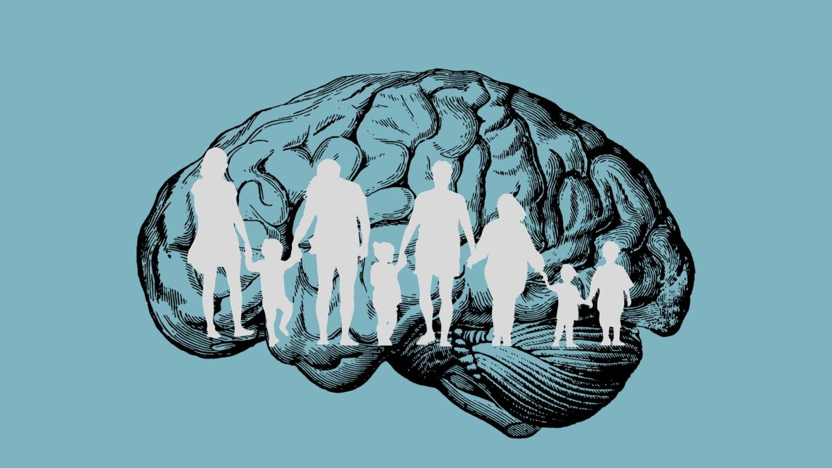 Silhouette of people, standing in front of a brain, symbolizing the thought process of a person in a big family. 