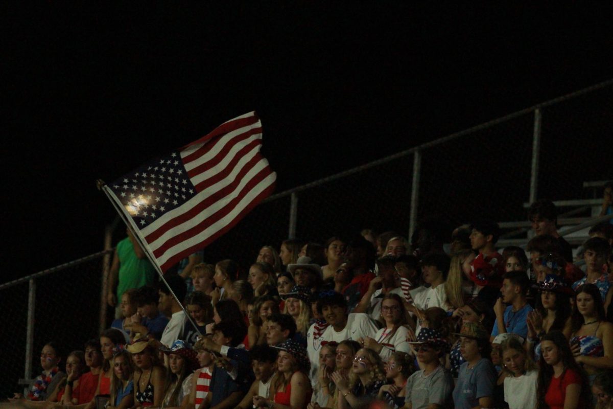 The student section roars with energy at Friday's home football game against North Myrtle Beach High School. The student section theme was USA. 