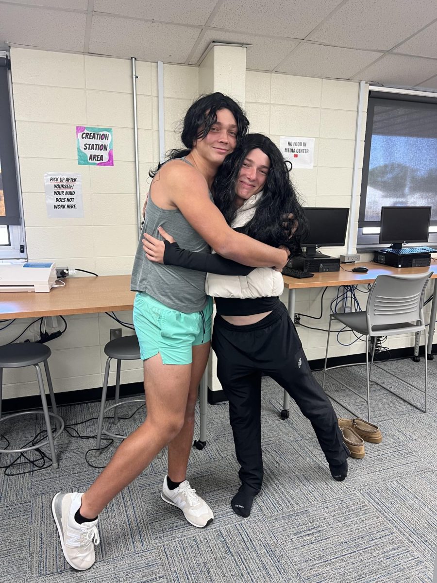 Juniors Jude Surigao and Kyle McCoy hug it out on Type Tuesday.