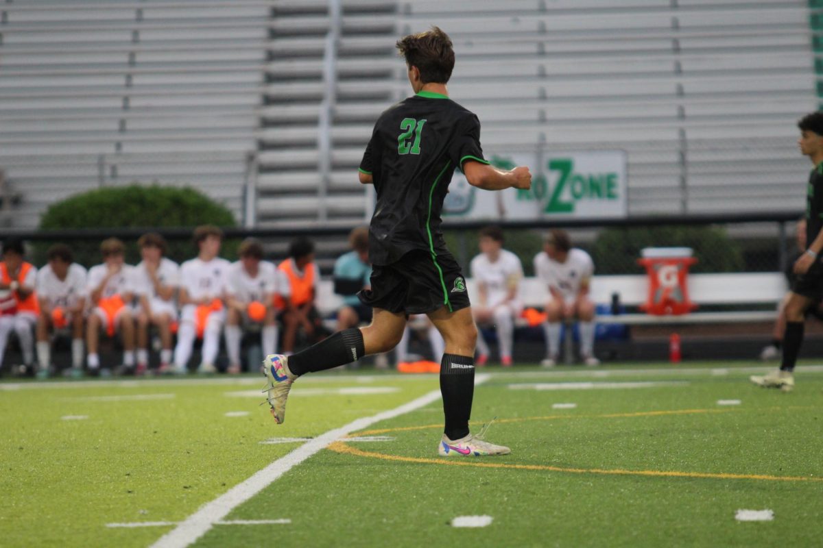 Boston Babson running downfield to get into position.