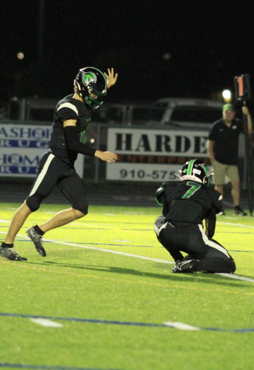 Number 10, Joseph Hamric, lines up a field goal against North Myrtle Beach Highschool.