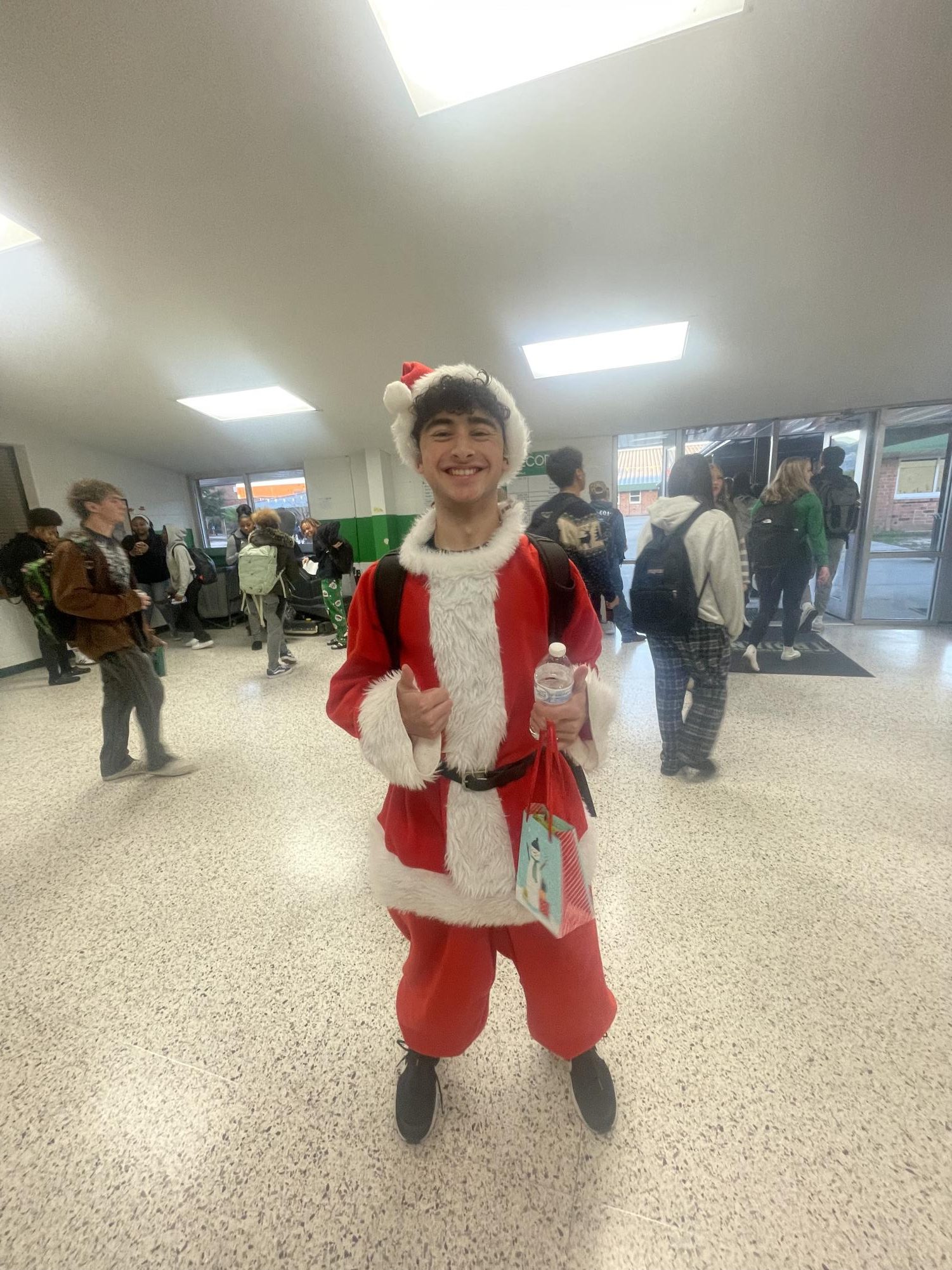 Junior Nicholas Tantillo dressed up in his Santa suit. 