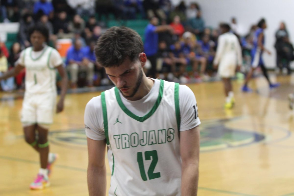 Junior Matthew McKenney grabbing the ball from out of bounds to pass it back in.