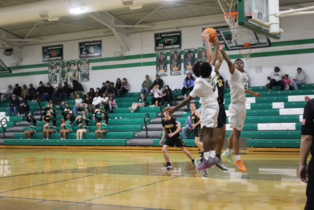 Sophomores Motashi Lance and Tyrone Williams, going up for a rebound.