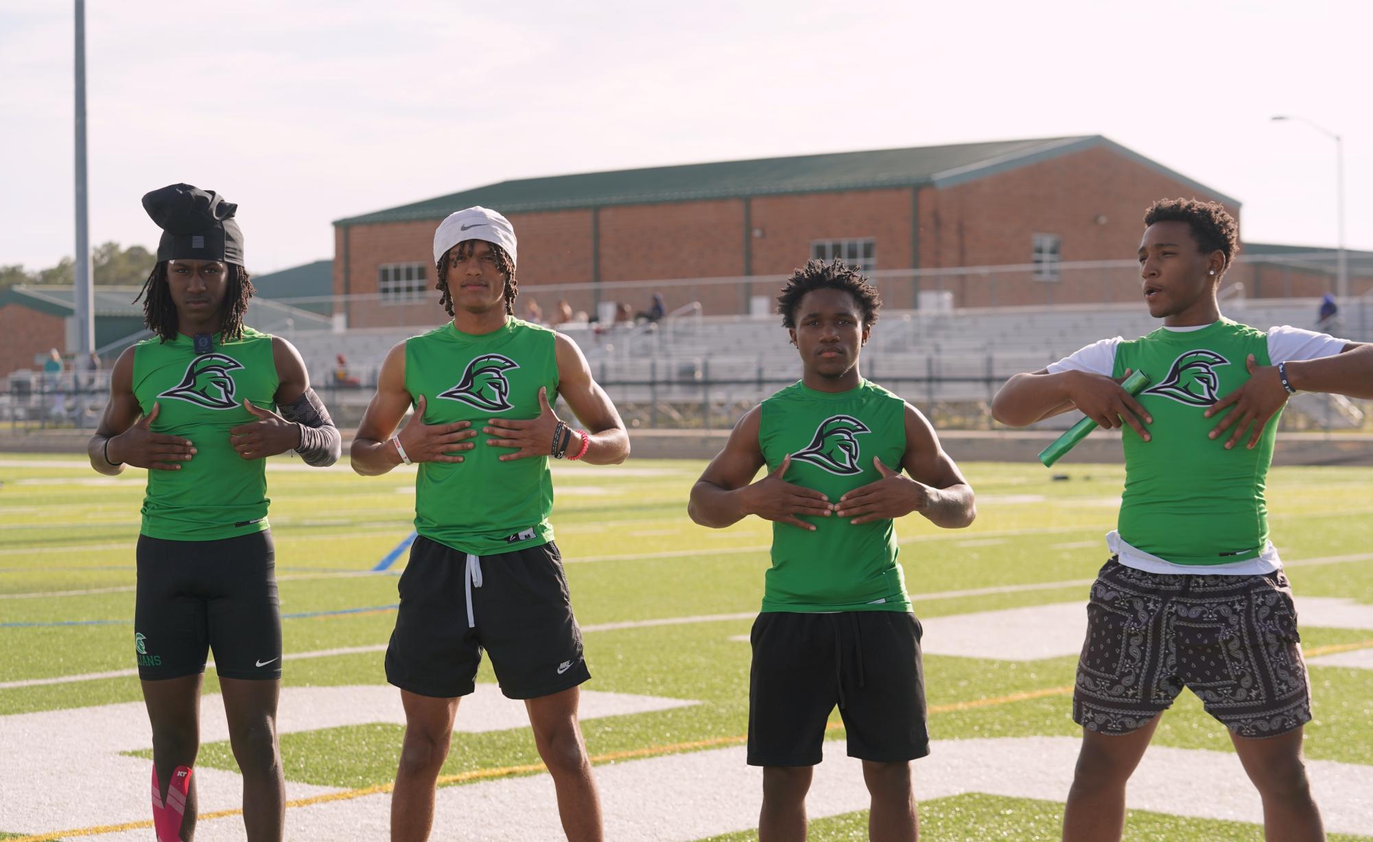 Caleb Gerald, Deshawm Brown, Motashi Lance, and Marzell Stanley posing for the picture before their race.