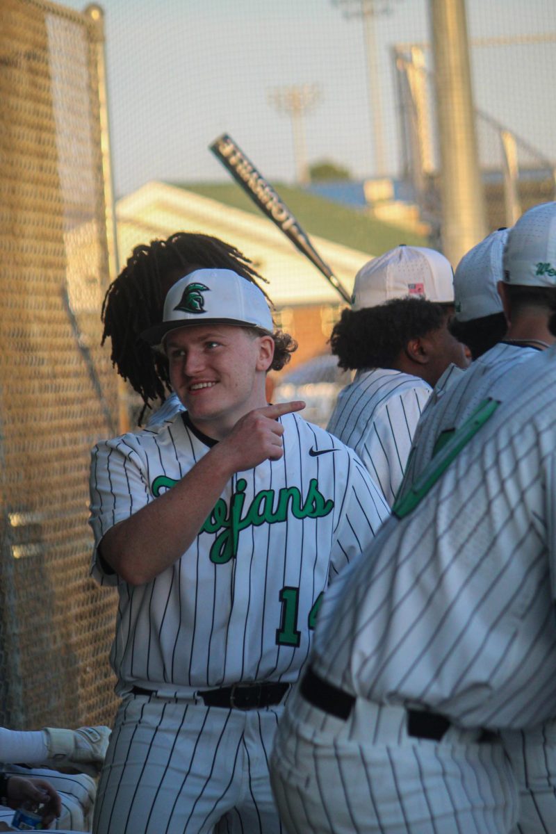 Junior Ethan Click talking to teammates about the hit that just took place. 