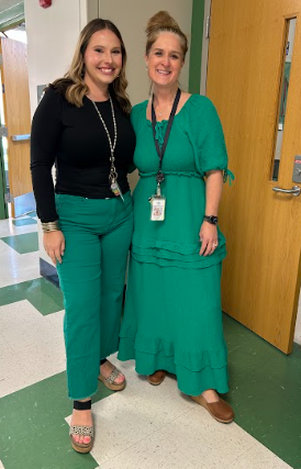 Ms Fluharty and Mrs Babson wearing green.
