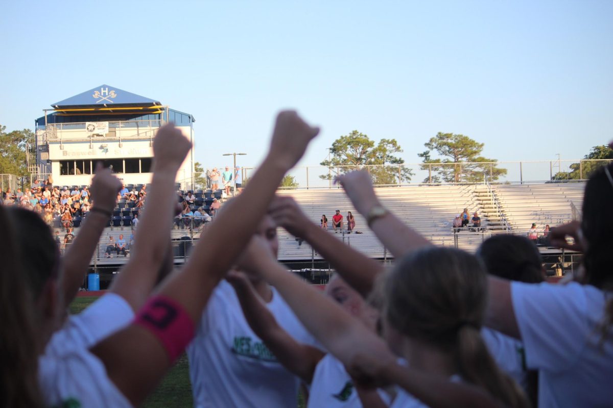 Lady Trojans breaking it down before the second half.