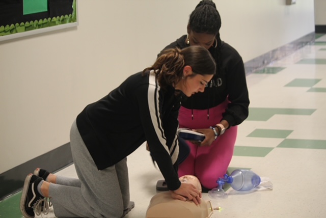 Jayla Alejandro doing chest compression's .