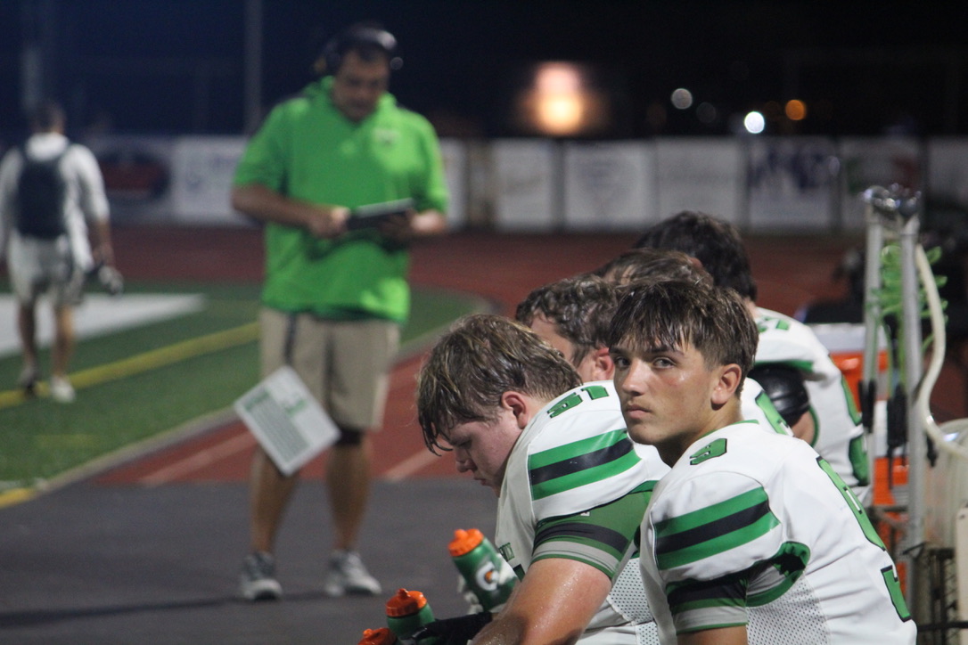 Junior Eden Romero sitting on the sidelines.