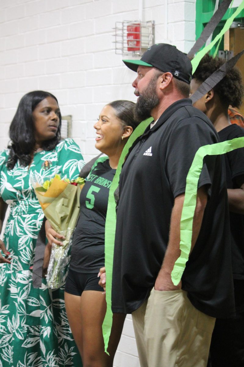 Senior Katelyn Woodard and her family before her name was announced. 