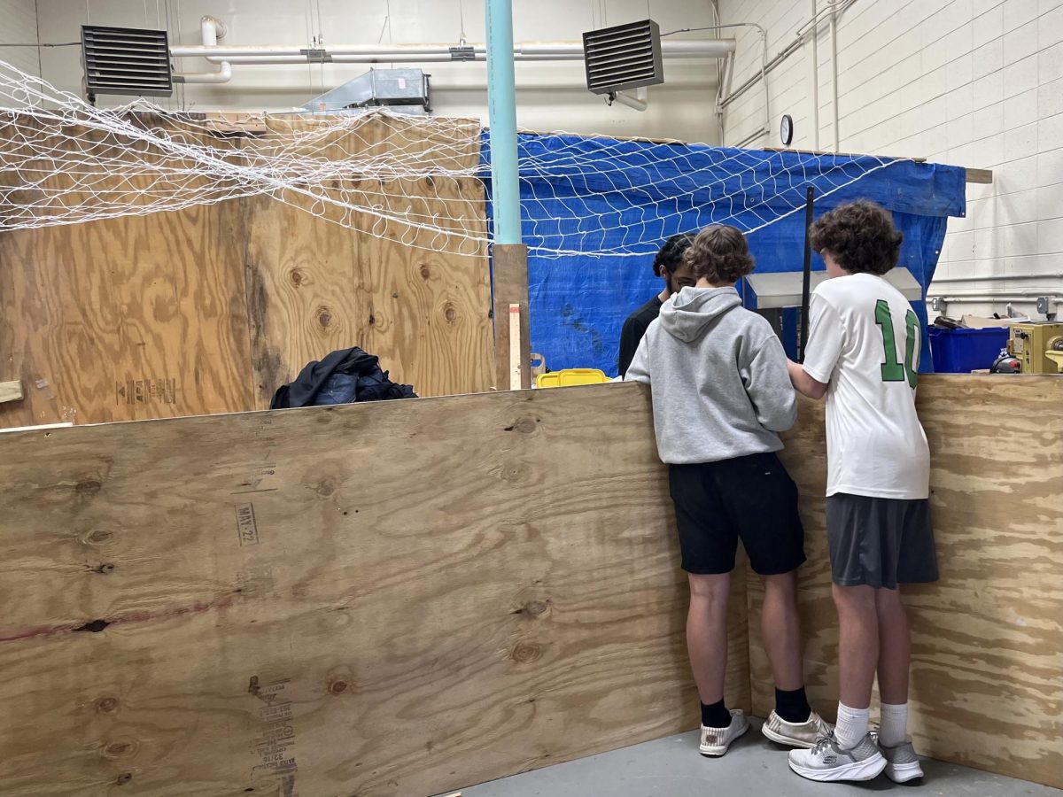 Students from Mr. Rouleau's Construction Core class working on the Haunted Workshop.