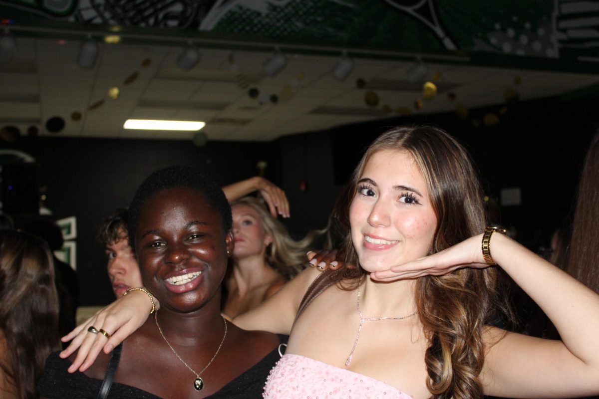 Seniors Naya Trott and Zuweratu Ayuuba posing for the camera.