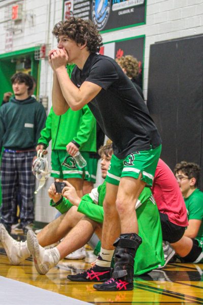 Junior Josh Connick cheering on his team mates.