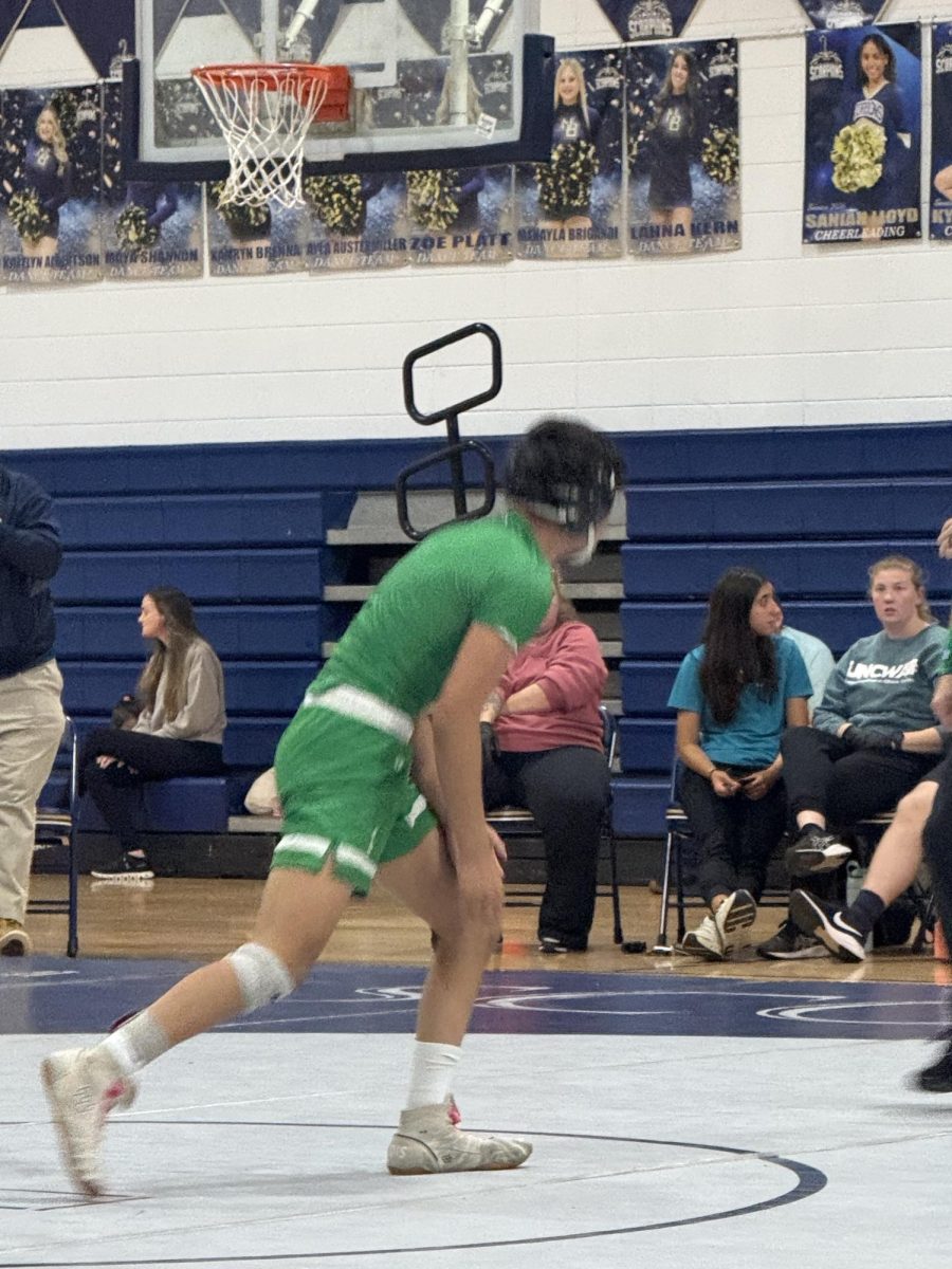 Varsity player Tristan Winbrurn ready to face his opponent .